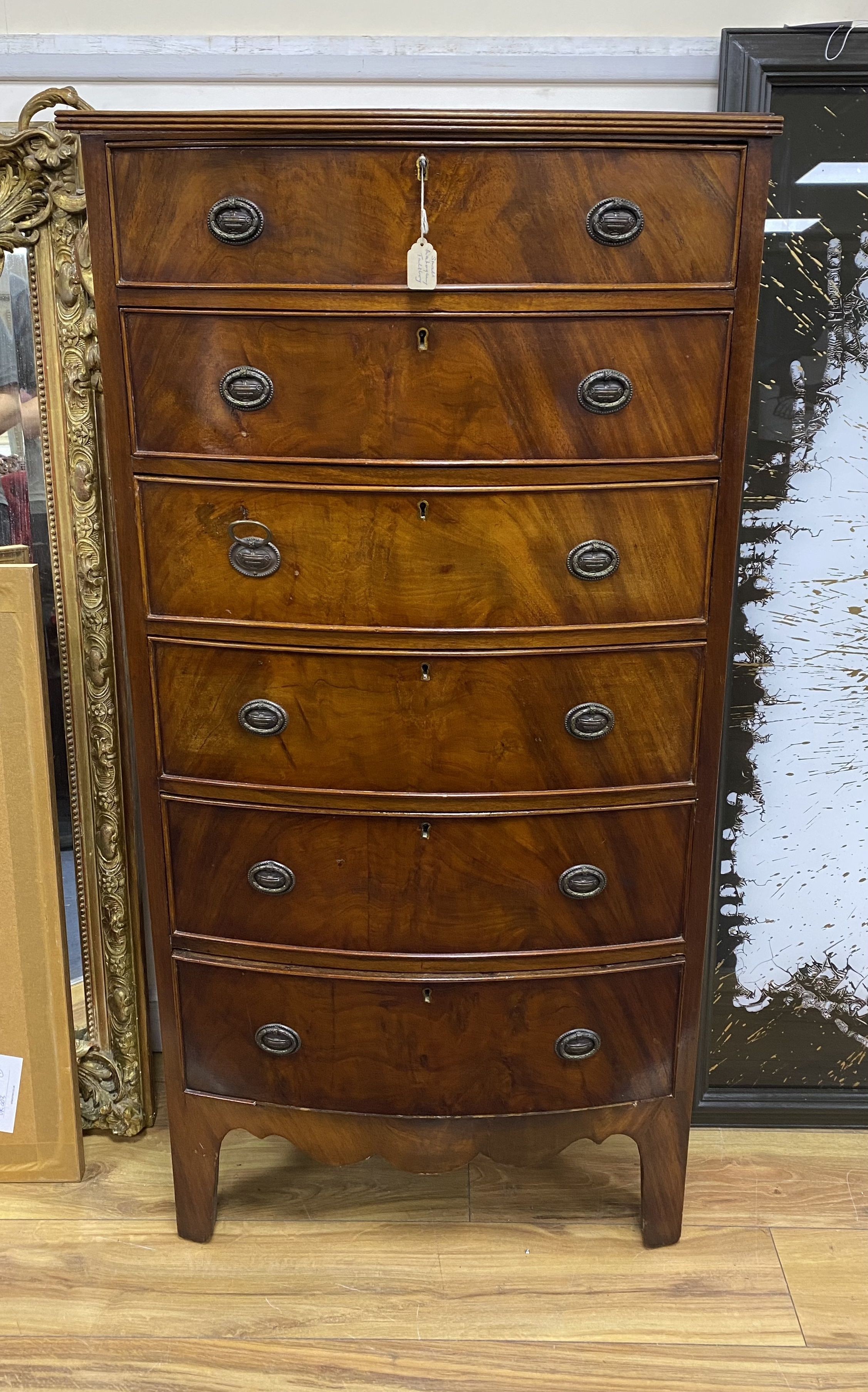 A George III style mahogany bow fronted chest, width 60cm, depth 38cm, height 123cm